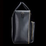 Mark Giusti Saddle Leather Travel Bag - side view 800x567px