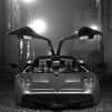 Pagani Huayra - front view door opened 480x720px