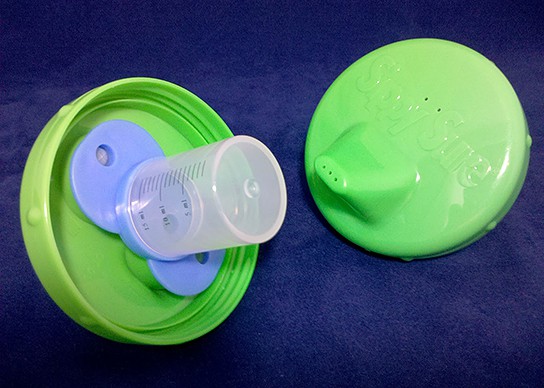 Sippy Sure - cup top with medicine cup and valve base attached 544x388px