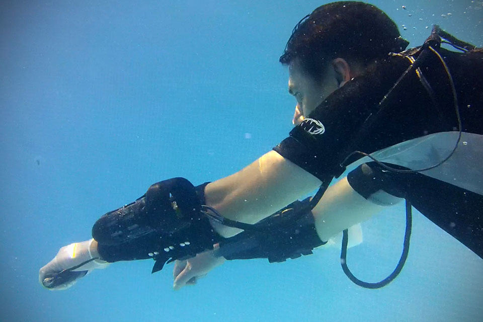 The x2 jet pack lets you effortlessly soar underwater like a dolphin