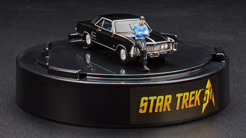 Hot Wheels Tiny Spock Leaning on a 1964 Buick Riviera